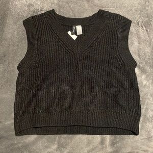 Black sweater vest